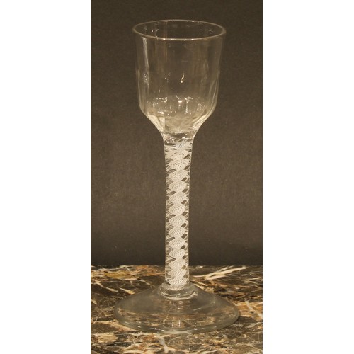 298 - A George III opaque twist drinking glass, moulded bowl, double-helix cotton twist stem, domed circul... 