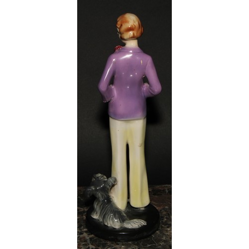 276 - An Art Deco Goebel figure, of a young lady and a dog, 24cm high, impressed monogram, model no. FF10,... 