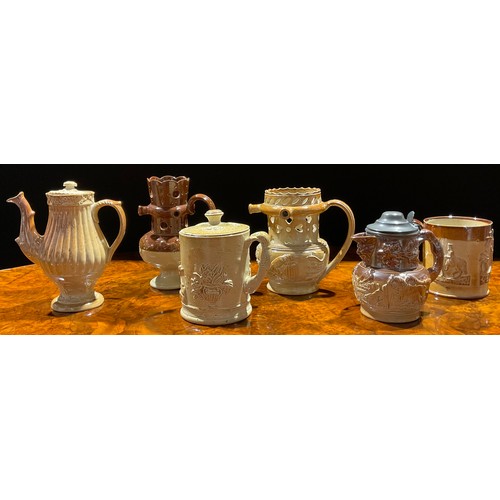 89 - A 19th century Brampton salt glazed stoneware puzzle jug, shaped cresting, the neck pierced with hea... 