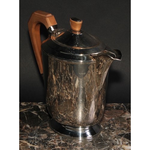 806 - An Elizabeth II silver coffee pot, in the Art Deco taste, angular wooden handle, oval pedestal base,... 