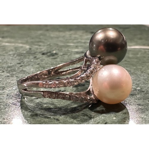 913 - A south sea grey and creamy white cultured pearl and diamond ring, slightly twist set with large pea... 