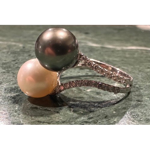 913 - A south sea grey and creamy white cultured pearl and diamond ring, slightly twist set with large pea... 