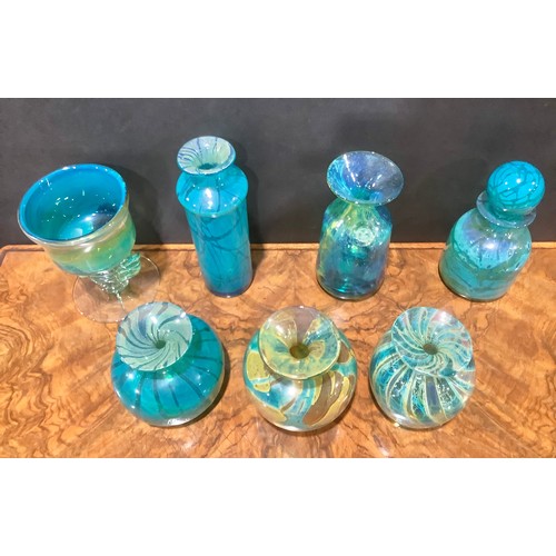 312 - A Mdina art glass chalice, designed by Michael Harris, in tones of blue and green, shaped knopped st... 