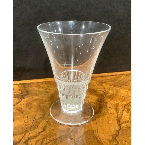 302 - A Lalique Bourgueil Verre No.4 conical wine glass, 10cm high, marked; a Lalique Pouilly wine glass, ... 