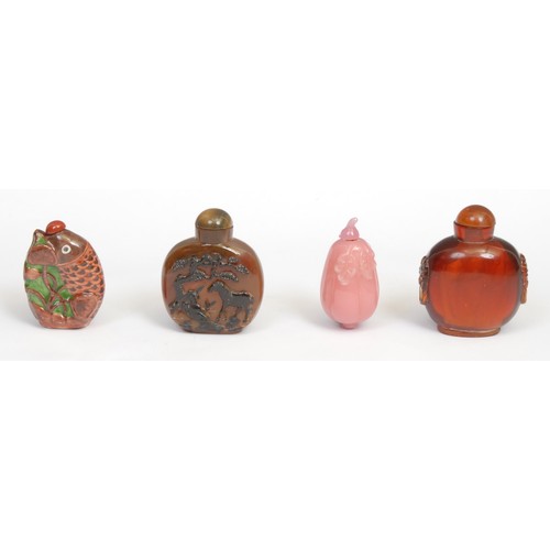 382 - A Chinese agate snuff bottle, carved with horses beneath a tree, 7cm high; a pink hardstone snuff, a... 