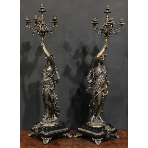 2169 - Jean-Louis Grégoire (French, 1840-1890), after, a pair of patinated bronze figural candelabra, signe... 