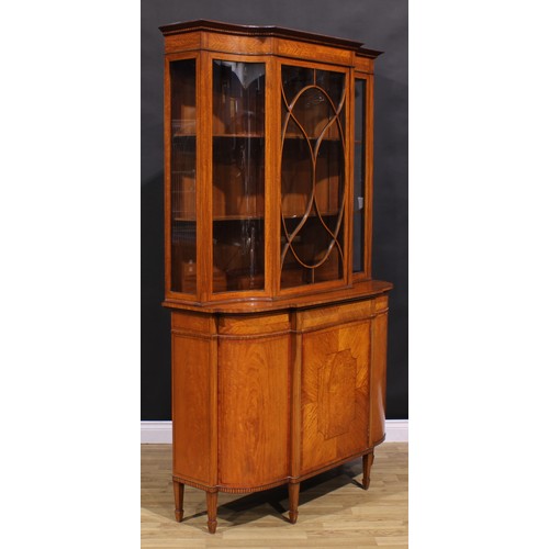 1559 - An Edwardian Sheraton Revival tulipwood and rosewood crossbanded satinwood break-centre display cabi... 