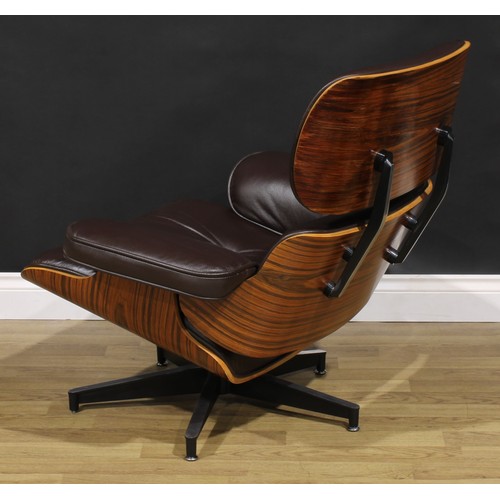 1472 - A santos palisander and leather Eames lounge chair and Ottoman, after Charles and Ray Eames and Herm... 