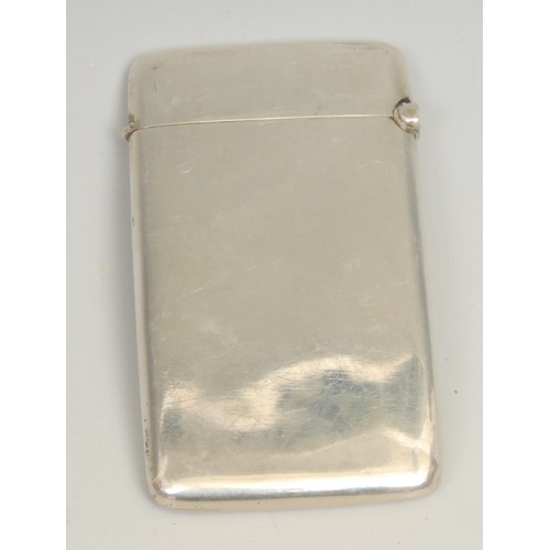 773 - An Edward VII silver Arts and Crafts rounded rectangular visiting card case, set with a central styl... 