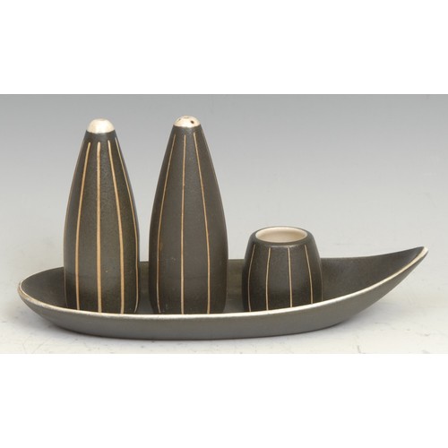 159 - A Denby Tigo Ware monochrome three piece cruet set, on shaped oval stand, designed by Tibor Reich (1... 