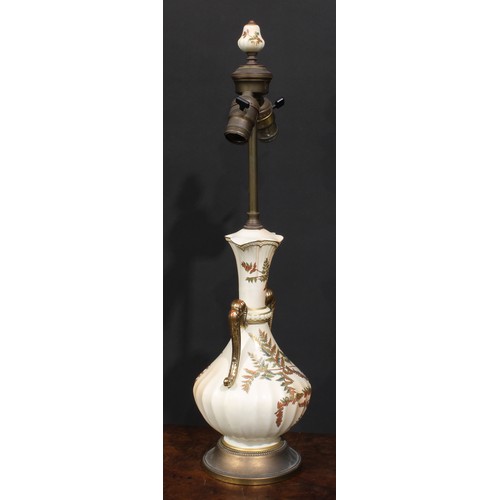 188 - A Royal Worcester blush ivory fluted ovoid table lamp, decorated and picked out in gilt with fern, 6... 