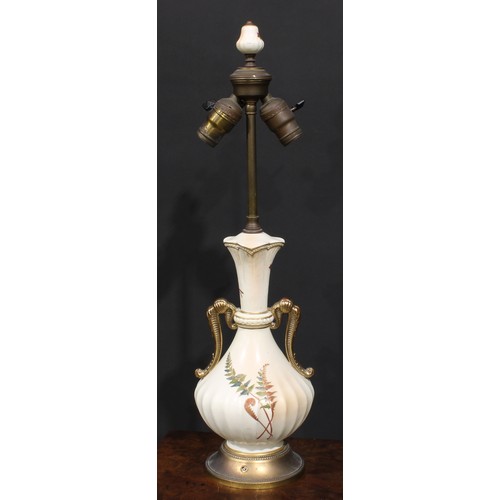 188 - A Royal Worcester blush ivory fluted ovoid table lamp, decorated and picked out in gilt with fern, 6... 