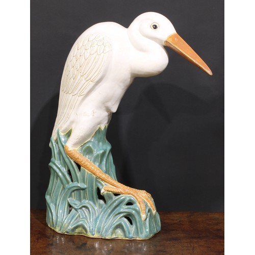 24 - A large mid-20th century Bohemian ceramic model, possibly Bechyně, of an egret, 63cm high
