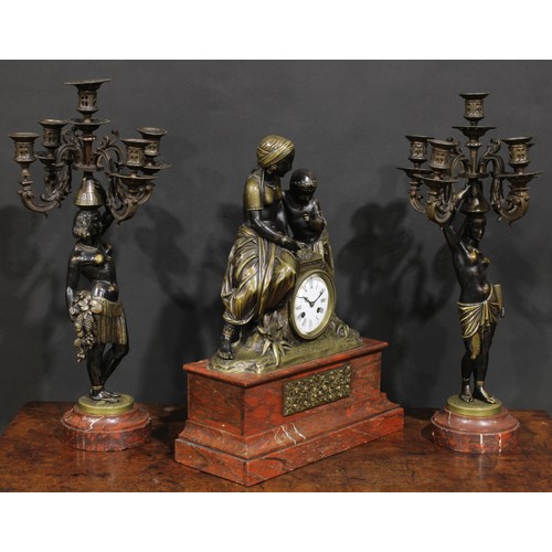 1575 - A 19th century French Egyptian Revival bronze and marble figural clock garniture, 9cm circular dial ... 