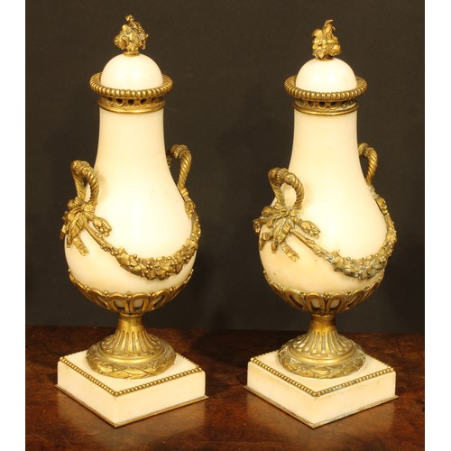 2146 - A pair of Louis XVI Revival gilt metal mounted marble pear shaped cassolettes, 30.5cm high, late 19t... 