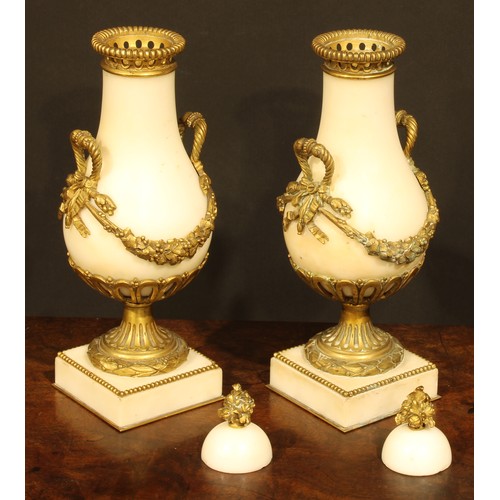 2146 - A pair of Louis XVI Revival gilt metal mounted marble pear shaped cassolettes, 30.5cm high, late 19t... 