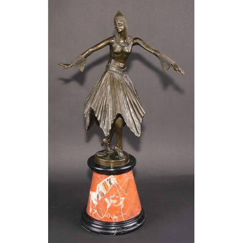 1639 - An Art Deco style dark patinated bronze, after Demétre Chiparus, dancing girl in cap with swirling s... 