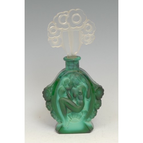 2116 - An Art Deco carved malachite scent bottle, each oval cartouche with seated female nude, clear cut gl... 