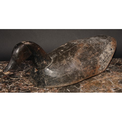 2090 - Folk Art -a North American/Canadian carved and painted decoy duck, as a goose, the full-bodied form ... 