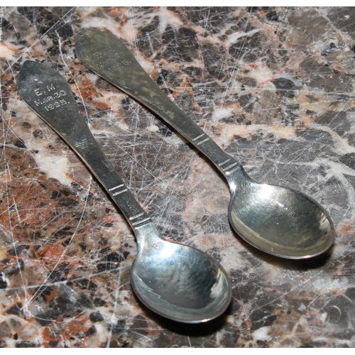 827 - Georg Jensen - a silver open salt, organic scroll handle, lightly planished bowl, 5.3cm wide, number... 