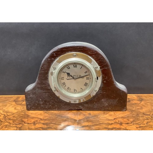 2575 - Automobilia - a Napier dashboard clock, Roman numerals on silvered dial, later set in oak mount, 11c... 