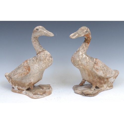 1276 - Folk Art - a pair of naively carved wooden ducks, 29cm high