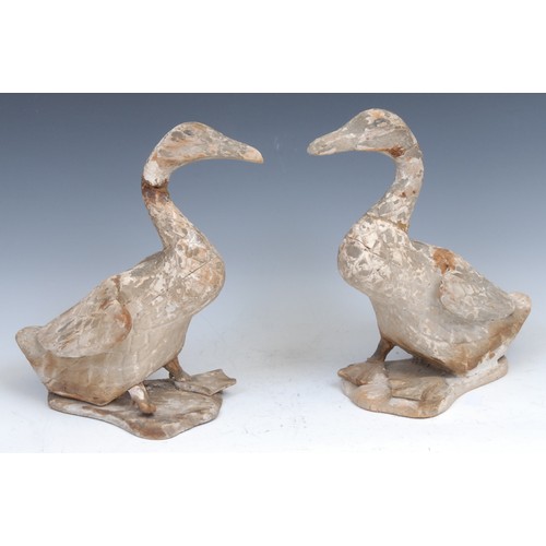 1276 - Folk Art - a pair of naively carved wooden ducks, 29cm high