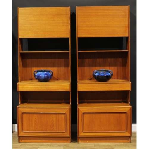 2102 - A pair of A. H. McIntosh & Co Ltd Scottish teak side cabinets, 187.5cm high, 73cm wide, 41cm deep, c... 