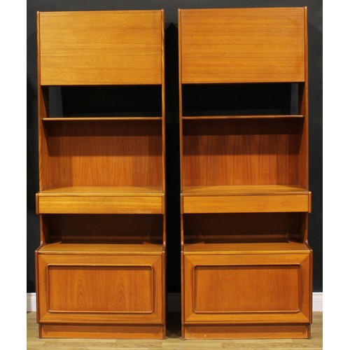 2102 - A pair of A. H. McIntosh & Co Ltd Scottish teak side cabinets, 187.5cm high, 73cm wide, 41cm deep, c... 