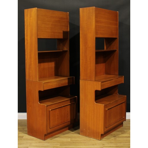 2102 - A pair of A. H. McIntosh & Co Ltd Scottish teak side cabinets, 187.5cm high, 73cm wide, 41cm deep, c... 