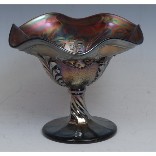 54 - An American Northwood carnival amethyst glass pedestal bon-bon dish, moulded with leafy ferns and co... 