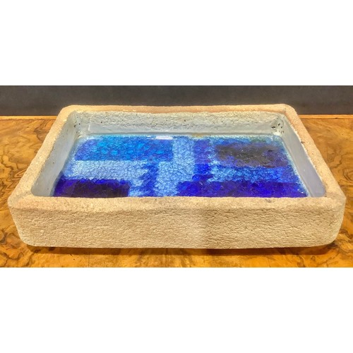 14 - Studio Pottery - a stoneware rectangular dish, the base applied with blue glass, monogrammed, 24cm w... 