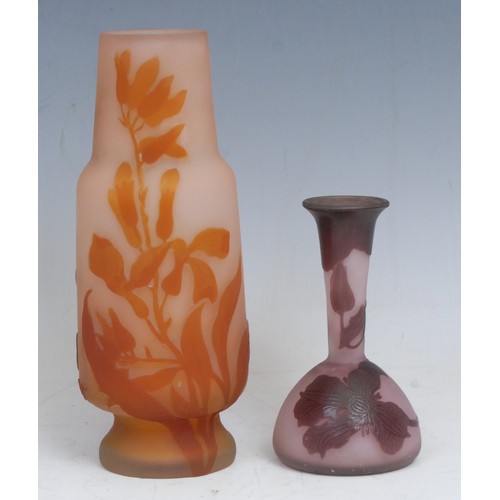 72 - A Gallé style pâte de verre cameo glass vase, incised with orange leafy fronds on a salmon pink grou... 