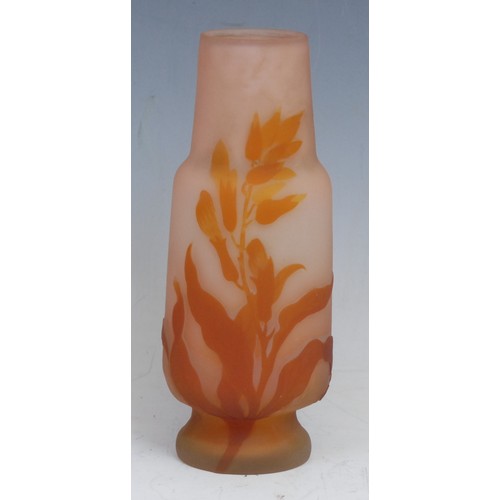 72 - A Gallé style pâte de verre cameo glass vase, incised with orange leafy fronds on a salmon pink grou... 