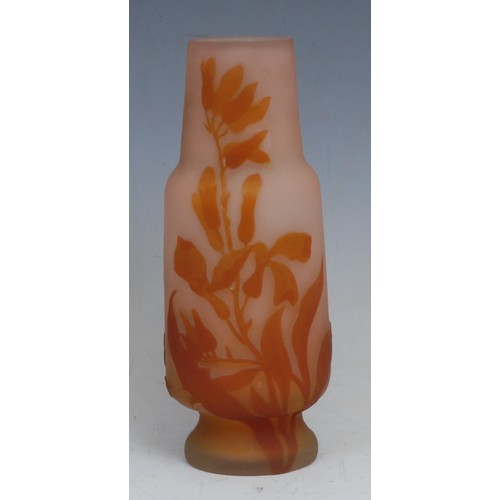 72 - A Gallé style pâte de verre cameo glass vase, incised with orange leafy fronds on a salmon pink grou... 
