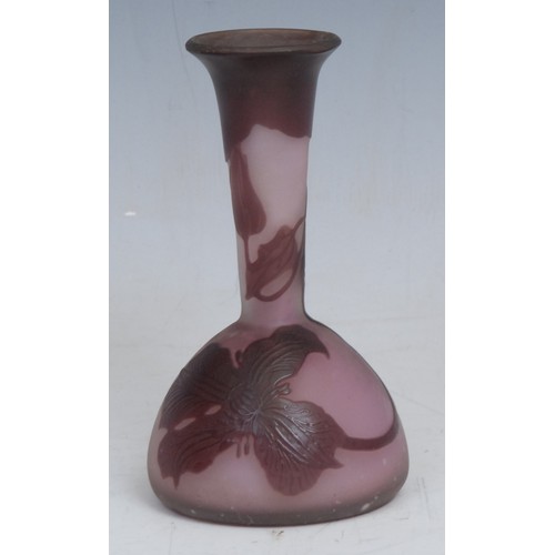 72 - A Gallé style pâte de verre cameo glass vase, incised with orange leafy fronds on a salmon pink grou... 