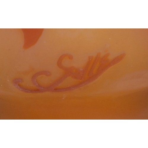 72 - A Gallé style pâte de verre cameo glass vase, incised with orange leafy fronds on a salmon pink grou... 