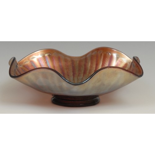 66 - A carnival amethyst glass iridescent fluted bowl, Good Luck, with horse shoe, 22cm diameter; others,... 