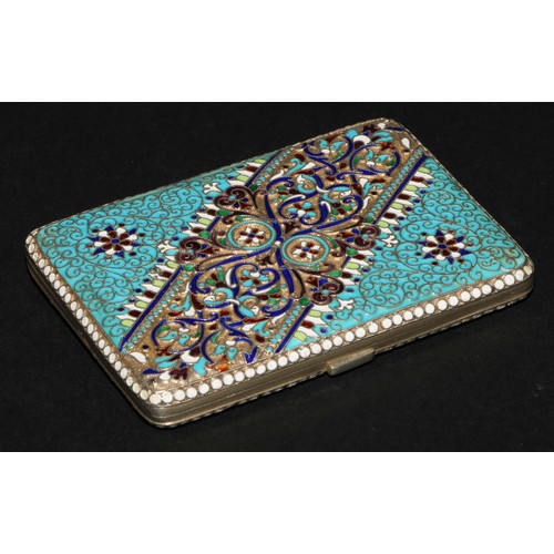 686 - A Russian silver-gilt and cloisonne enamel rounded rectangular cigarette case, hinged cover, 9.5cm l... 