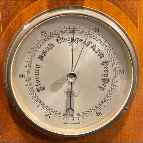 1319 - An Edwardian Yorkshire satinwood banded mahogany aneroid barometer, by M. Cohen & Son, 11 Darley Str... 