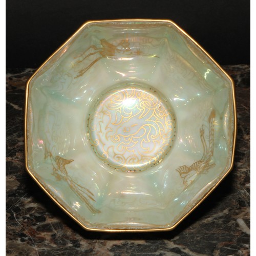 85 - A Wedgwood Fairyland lustre octagonal bowl, gilt decoration, with phoenix to interior, and a dragon ... 