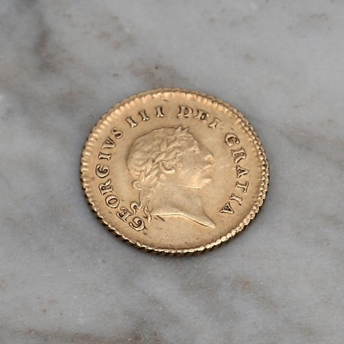 2605 - Coins - A George III gold 1/3 Guinea, 1810