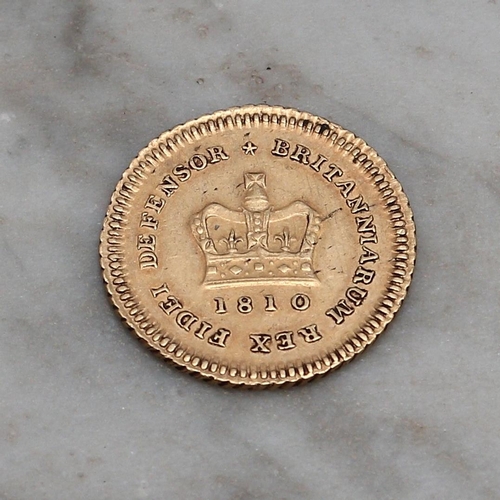 2605 - Coins - A George III gold 1/3 Guinea, 1810