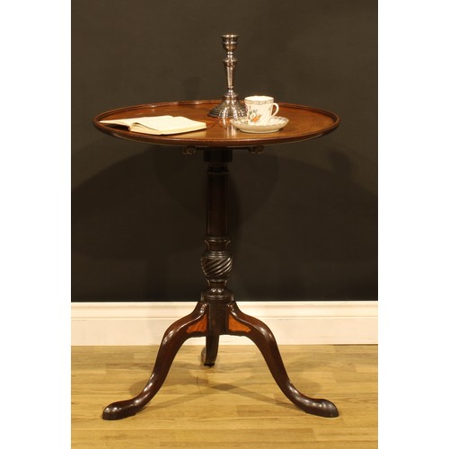 1529 - A 19th century Sheraton Revival mahogany tripod occasional table, circular tilting top inlaid with a... 