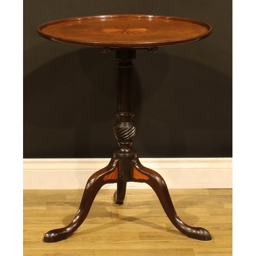 1529 - A 19th century Sheraton Revival mahogany tripod occasional table, circular tilting top inlaid with a... 