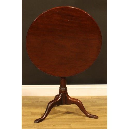 1533 - A George III mahogany tripod occasional table, one-piece circular tilting top, turned column, cabrio... 