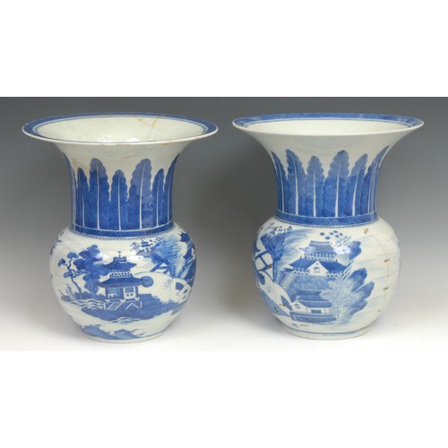 354 - A pair of Chinese blue and white vases, 31cm; a Chinese Famille Rose bowl (3)