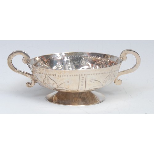 754 - An early 18th century silver quaiche, marks rubbed, London hallmark, 11cm wide