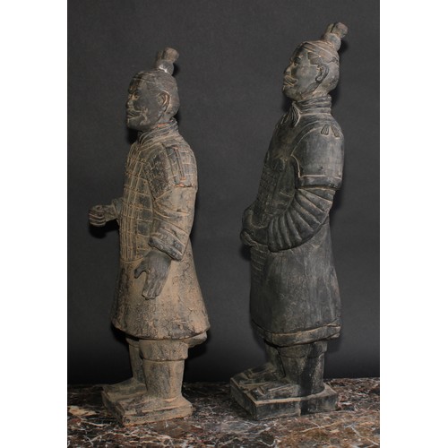 432 - A pair of Chinese terracotta figures, after the warriors of the Terracotta Army of Qin Shi Huang, 53... 