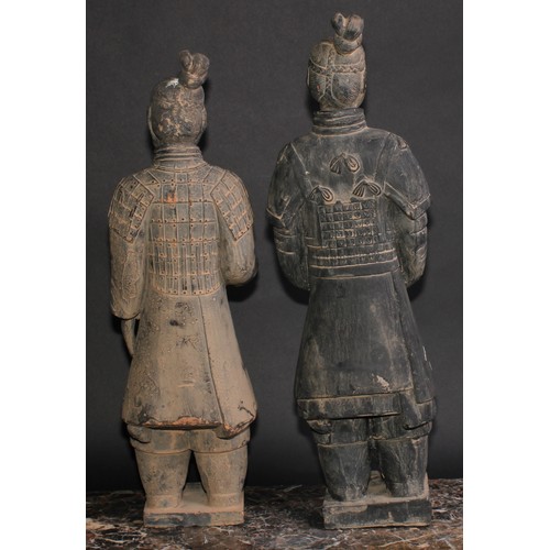 432 - A pair of Chinese terracotta figures, after the warriors of the Terracotta Army of Qin Shi Huang, 53... 